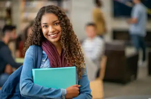Student with Notebook